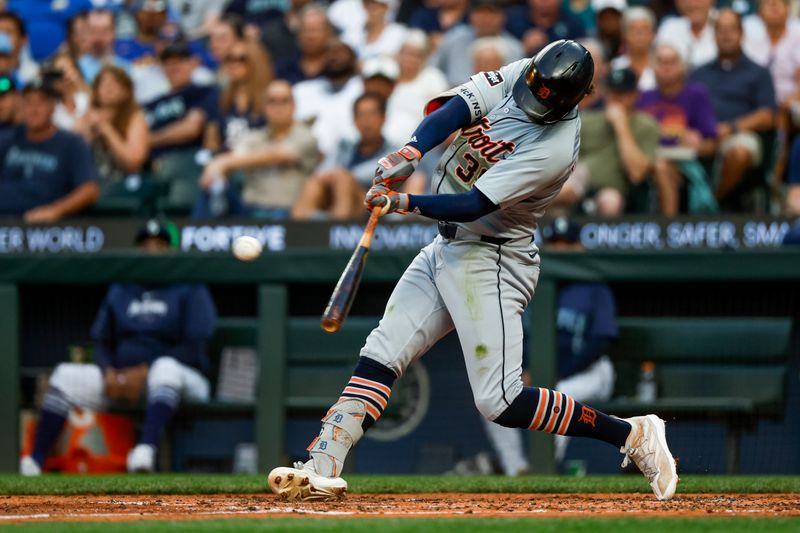 Aug 8, 2024; Seattle, Washington, USA; Detroit Tigers shortstop Zach McKinstry (39) hits a two-run double against the Seattle Mariners during the fifth inning at T-Mobile Park. Mandatory Credit: Joe Nicholson-USA TODAY Sports