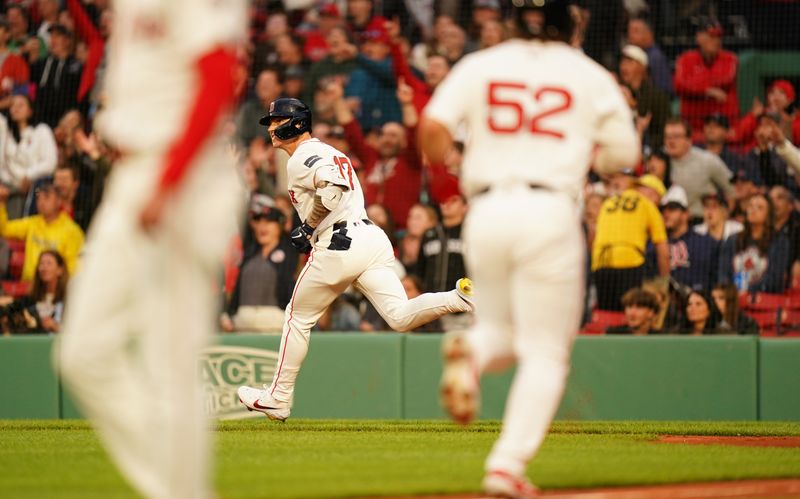 May 13, 2024; Boston, Massachusetts, USA; Boston Red Sox designated hitter Tyler O'Neill (17) hits a three run home run against the Tampa Bay Rays in the first inning at Fenway Park. Mandatory Credit: David Butler II-USA TODAY Sports