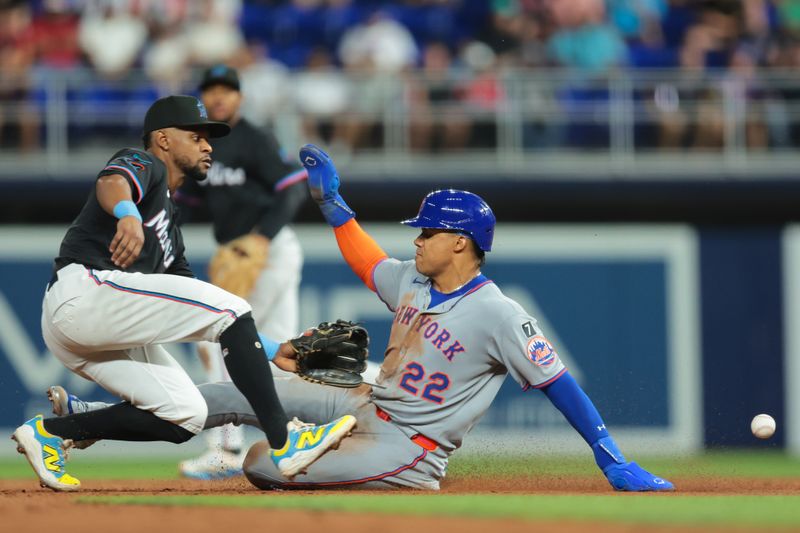 Sep 26, 2025; Miami, Florida, USA; New York Mets right fielder Juan Soto (22) steals second base against Miami Marlins shortstop Otto Lopez (6) during the third inning at loanDepot Park. Mandatory Credit: Sam Navarro-Imagn Images