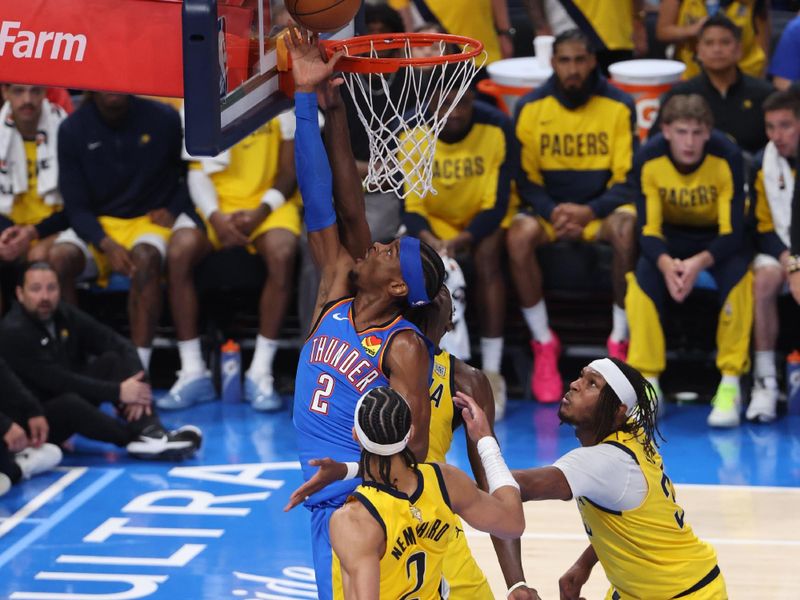 OKLAHOMA CITY, OK - JUNE 8: Shai Gilgeous-Alexander #2 of the Oklahoma City Thunder drives to the basket during the game against the Indiana Pacers during Game 2 of the 2025 NBA Finals on June 8, 2025 at Paycom Center in Oklahoma City, Oklahoma. NOTE TO USER: User expressly acknowledges and agrees that, by downloading and or using this photograph, User is consenting to the terms and conditions of the Getty Images License Agreement. Mandatory Copyright Notice: Copyright 2025 NBAE (Photo by Joe Murphy/NBAE via Getty Images)