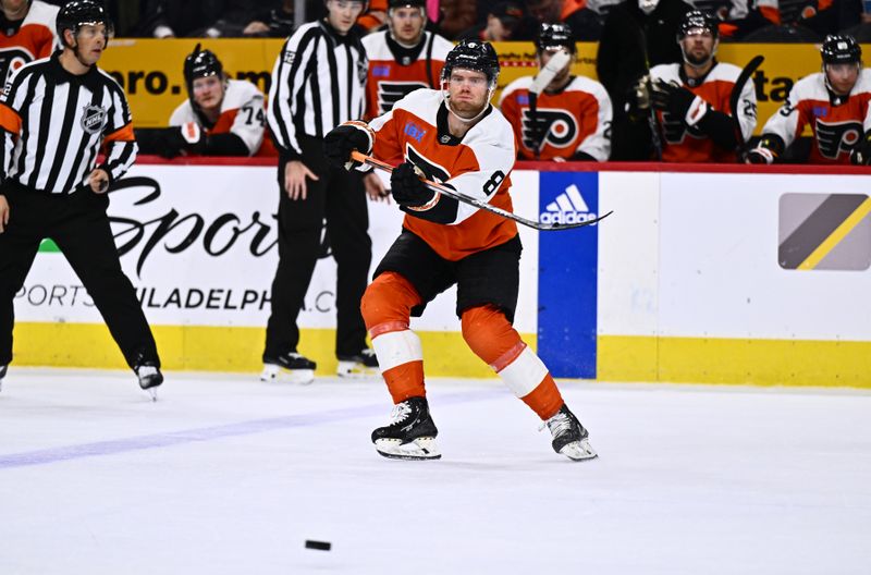 Jan 20, 2024; Philadelphia, Pennsylvania, USA; Philadelphia Flyers defenseman Cam York (8) passes the puck against the Colorado Avalanche in the second period at Wells Fargo Center. Mandatory Credit: Kyle Ross-USA TODAY Sports