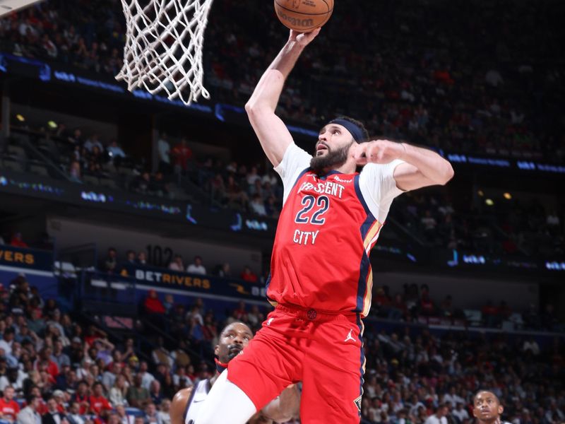 NEW ORLEANS, LA - APRIL 19:  Larry Nance Jr. #22 of the New Orleans Pelicans goes to the basket during the game against the Sacramento Kings during the 2024 Play-In Tournament on April 19, 2024 at the Smoothie King Center in New Orleans, Louisiana. NOTE TO USER: User expressly acknowledges and agrees that, by downloading and or using this Photograph, user is consenting to the terms and conditions of the Getty Images License Agreement. Mandatory Copyright Notice: Copyright 2024 NBAE (Photo by Jeff Haynes./NBAE via Getty Images)