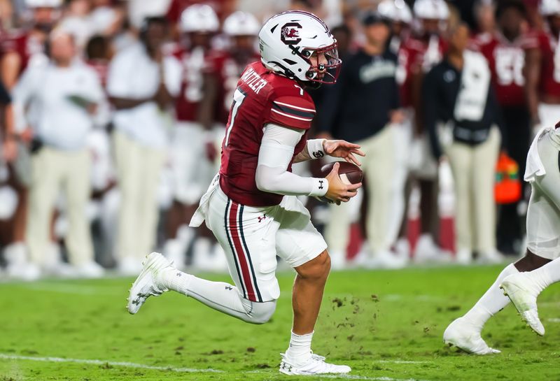 Sep 23, 2023; Columbia, South Carolina, USA; South Carolina Gamecocks quarterback Spencer Rattler (7) scrambles against the Mississippi State Bulldogs in the second quarter at Williams-Brice Stadium. Mandatory Credit: Jeff Blake-USA TODAY Sports