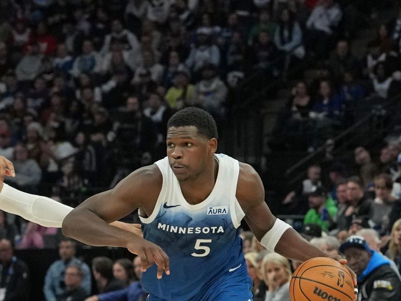 MINNEAPOLIS, MN -  MARCH 22: Anthony Edwards #5 of the Minnesota Timberwolves handles the ball during the game against the Cleveland Cavaliers on March 22, 2024 at Target Center in Minneapolis, Minnesota. NOTE TO USER: User expressly acknowledges and agrees that, by downloading and or using this Photograph, user is consenting to the terms and conditions of the Getty Images License Agreement. Mandatory Copyright Notice: Copyright 2024 NBAE (Photo by Jordan Johnson/NBAE via Getty Images)