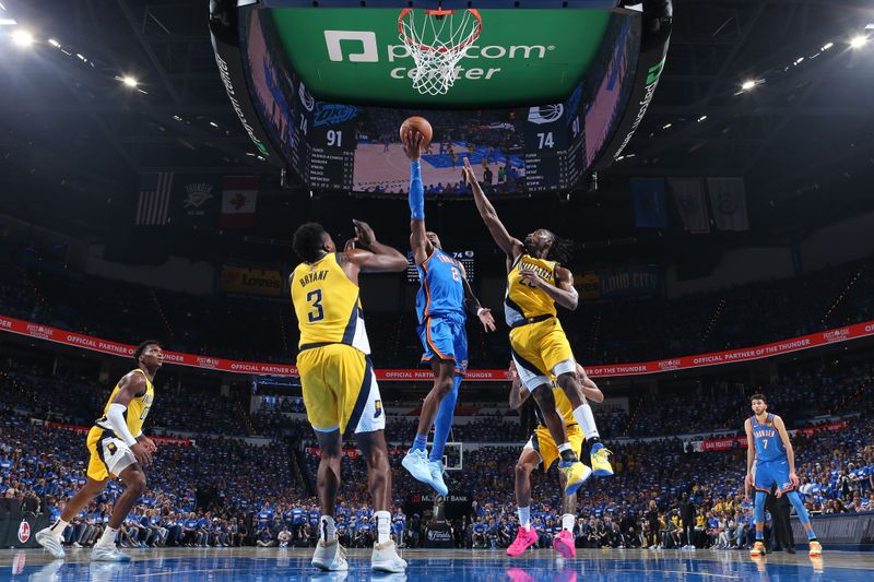OKLAHOMA CITY, OK - JUNE 8: Shai Gilgeous-Alexander #2 of the Oklahoma City Thunder drives to the basket during the game against the Indiana Pacers during Game Two of the 2025 NBA Finals on June 8, 2025 at Paycom Center in Oklahoma City, Oklahoma. NOTE TO USER: User expressly acknowledges and agrees that, by downloading and or using this photograph, User is consenting to the terms and conditions of the Getty Images License Agreement. Mandatory Copyright Notice: Copyright 2025 NBAE(Photo by Nathaniel S. Butler/NBAE via Getty Images)