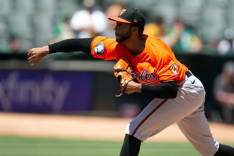 Jul 6, 2024; Oakland, California, USA; Baltimore Orioles pitcher Dillon Tate (55) delivers a pitch against the Oakland Athletics during the second inning at Oakland-Alameda County Coliseum. Mandatory Credit: D. Ross Cameron-USA TODAY Sports