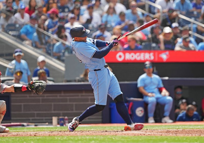 Aug 25, 2024; Toronto, Ontario, CAN; Toronto Blue Jays designated hitter George Springer (4) hits a broken bat single against the Los Angeles Angels during the fourth inning at Rogers Centre. Mandatory Credit: Nick Turchiaro-USA TODAY Sports