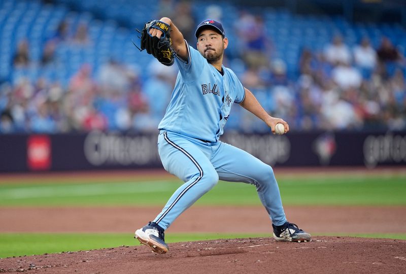 May 30, 2023; Toronto, Ontario, CAN; Toronto Blue Jays starting pitcher Yusei Kikuchi (16) pitches to the Milwaukee Brewers during the first inning at Rogers Centre. Mandatory Credit: John E. Sokolowski-USA TODAY Sports