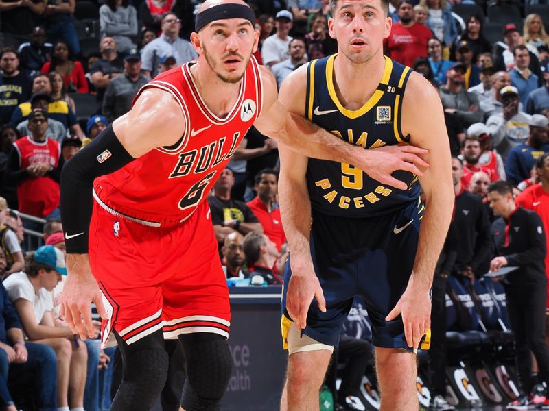 INDIANAPOLIS, IN - MARCH 13:  Alex Caruso #6 of the Chicago Bulls & T.J. McConnell #9 of the Indiana Pacers looks on during the game on March 13, 2024 at Gainbridge Fieldhouse in Indianapolis, Indiana. NOTE TO USER: User expressly acknowledges and agrees that, by downloading and or using this Photograph, user is consenting to the terms and conditions of the Getty Images License Agreement. Mandatory Copyright Notice: Copyright 2024 NBAE (Photo by Ron Hoskins/NBAE via Getty Images)