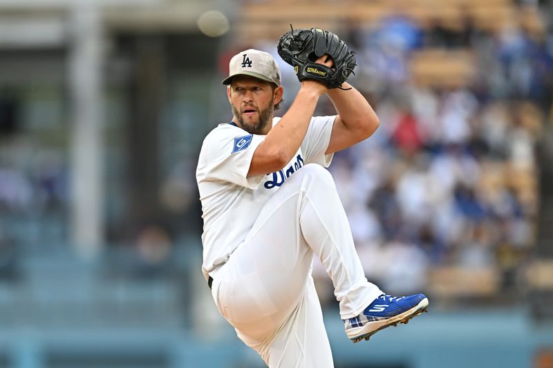 May 17, 2025; Los Angeles, California, USA; Los Angeles Dodgers pitcher Clayton Kershaw (22) pitches in the first inning against the Los Angeles Angels at Dodger Stadium. Mandatory Credit: Jonathan Hui-Imagn Images