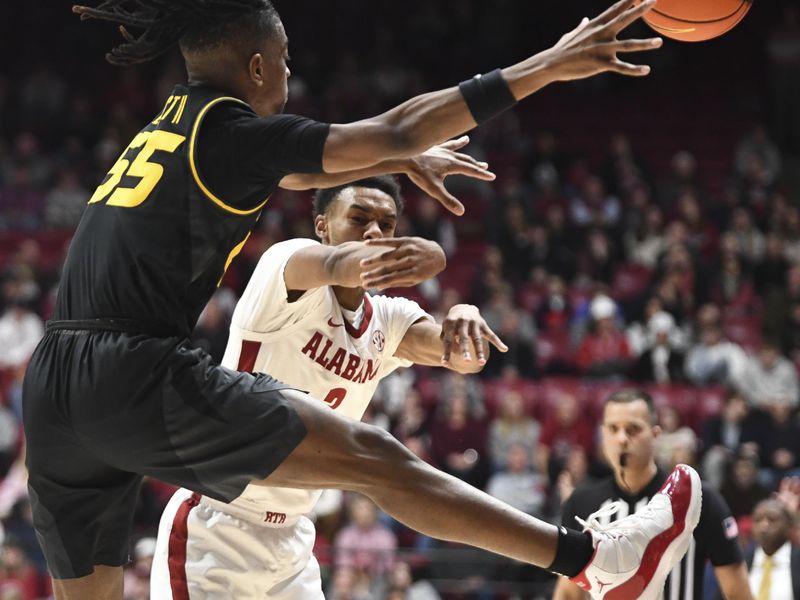 Jan 16, 2024; Tuscaloosa, Alabama, USA; Alabama guard Rylan Griffen (3) makes a pass with Missouri guard Sean East II (55) defending in the game at Coleman Coliseum. Mandatory Credit: Gary Cosby Jr.-USA TODAY Sports