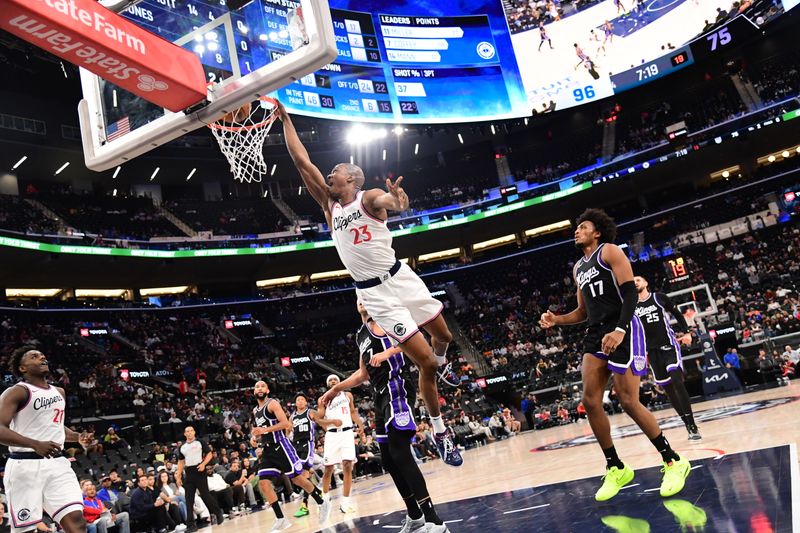 INGLEWOOD, CA - OCTOBER 17: Kai Jones #23 of the LA Clippers dunks the ball during the game against the Sacramento Kings during a NBA Preseason game on October 17, 2024 at Intuit Dome in Los Angeles, California. NOTE TO USER: User expressly acknowledges and agrees that, by downloading and/or using this Photograph, user is consenting to the terms and conditions of the Getty Images License Agreement. Mandatory Copyright Notice: Copyright 2024 NBAE (Photo by Adam Pantozzi/NBAE via Getty Images)