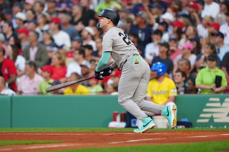 Jul 27, 2024; Boston, Massachusetts, USA; New York Yankees right fielder Alex Verdugo (24) hits a single against the Boston Red Sox during the first inning at Fenway Park. Mandatory Credit: Gregory Fisher-USA TODAY Sports