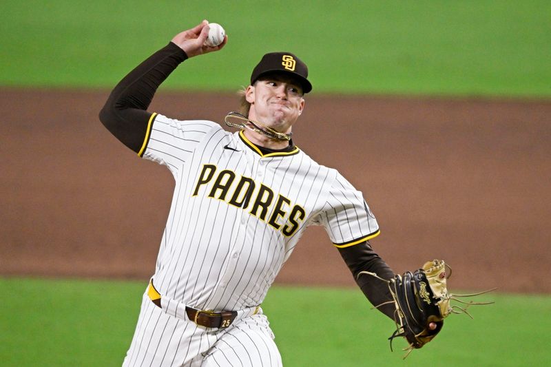 May 27, 2025; San Diego, California, USA; San Diego Padres pitcher Sean Reynolds (25) delivers during the sixth inning against the Miami Marlins at Petco Park. Mandatory Credit: Denis Poroy-Imagn Images