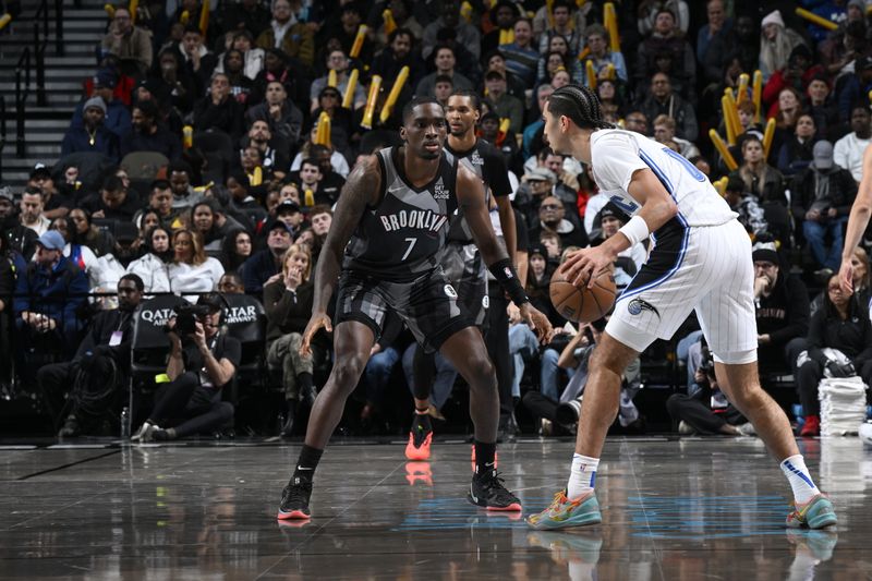 BROOKLYN, NY - DECEMBER 1: Shake Milton #7 of the Brooklyn Nets plays defense during the game against the Orlando Magic on December 1, 2024 at Barclays Center in Brooklyn, New York. NOTE TO USER: User expressly acknowledges and agrees that, by downloading and or using this Photograph, user is consenting to the terms and conditions of the Getty Images License Agreement. Mandatory Copyright Notice: Copyright 2024 NBAE (Photo by David Dow/NBAE via Getty Images)