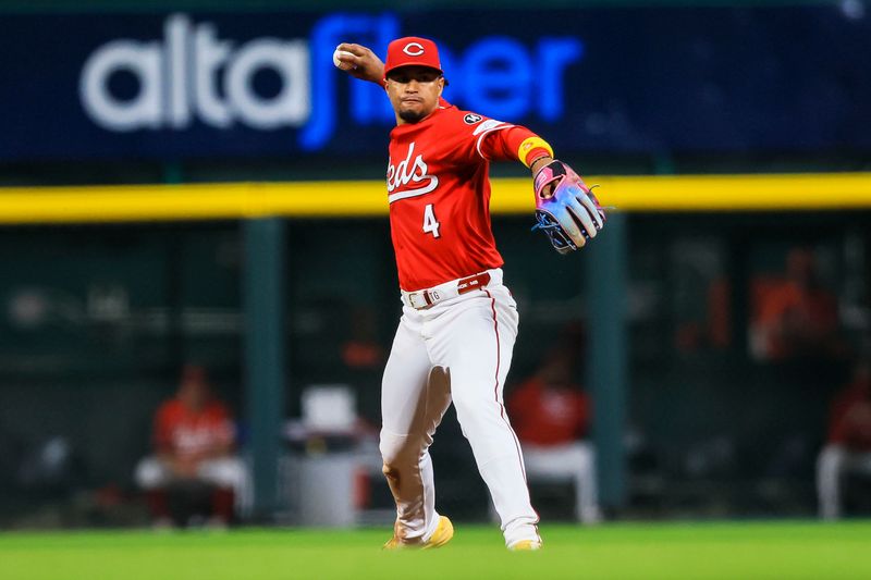 Apr 30, 2025; Cincinnati, Ohio, USA; Cincinnati Reds shortstop Santiago Espinal (4) throws to first to get St. Louis Cardinals outfielder Victor Scott II (not pictured) out in the ninth inning at Great American Ball Park. Mandatory Credit: Katie Stratman-Imagn Images