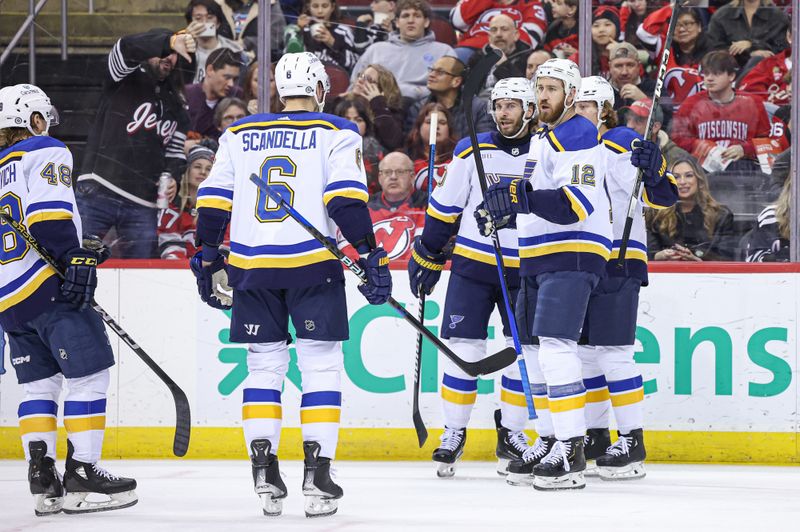 Mar 7, 2024; Newark, New Jersey, USA; St. Louis Blues left wing Brandon Saad (20) celebrates his goal with teammates during the second period against the New Jersey Devils at Prudential Center. Mandatory Credit: Vincent Carchietta-USA TODAY Sports