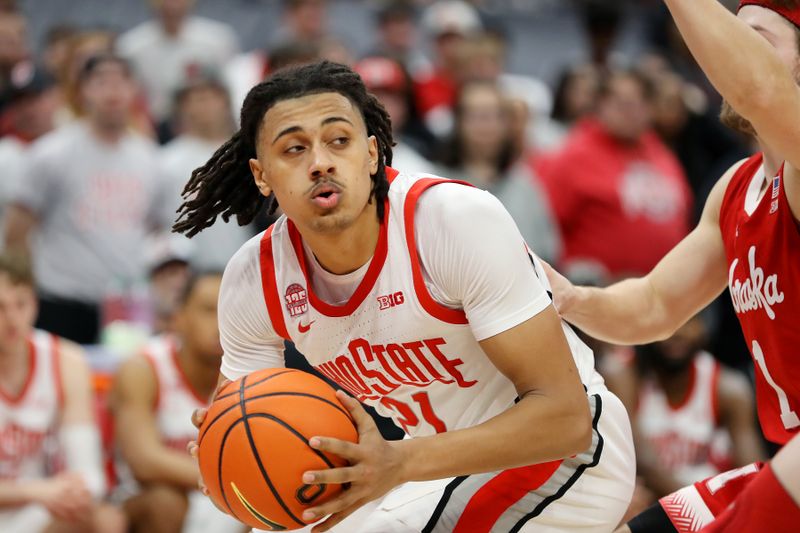 Feb 29, 2024; Columbus, Ohio, USA;  Ohio State Buckeyes forward Devin Royal (21) looks for space during the second half against the Nebraska Cornhuskers at Value City Arena. Mandatory Credit: Joseph Maiorana-USA TODAY Sports