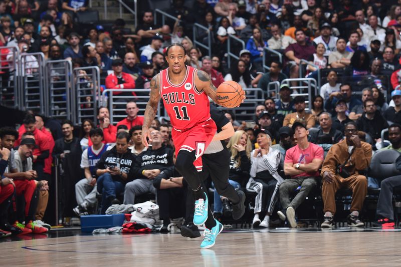 LOS ANGELES, CA - MARCH 9: DeMar DeRozan #11 of the Chicago Bulls dribbles the ball during the game against the LA Clippers on March 9, 2024 at Crypto.Com Arena in Los Angeles, California. NOTE TO USER: User expressly acknowledges and agrees that, by downloading and/or using this Photograph, user is consenting to the terms and conditions of the Getty Images License Agreement. Mandatory Copyright Notice: Copyright 2024 NBAE (Photo by Adam Pantozzi/NBAE via Getty Images)