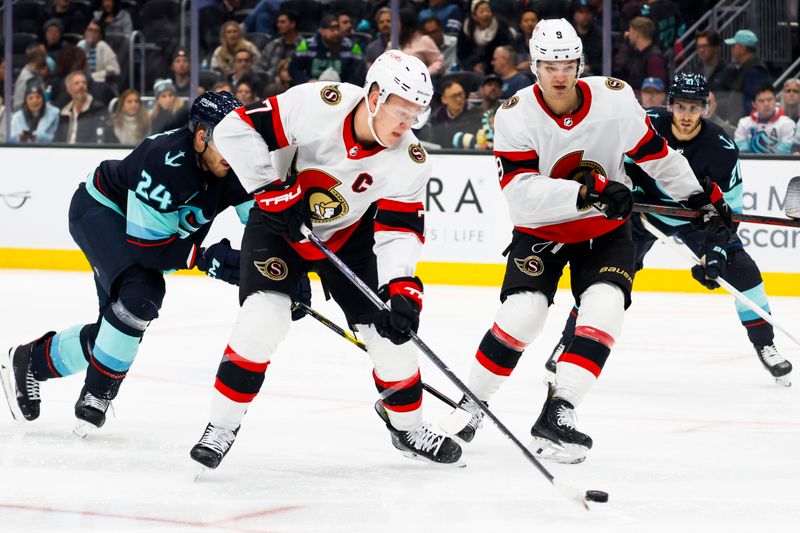 Jan 4, 2024; Seattle, Washington, USA; Ottawa Senators left wing Brady Tkachuk (7) skates with the puck ahead of center Josh Norris (9) against the Seattle Kraken during the first period at Climate Pledge Arena. Mandatory Credit: Joe Nicholson-USA TODAY Sports