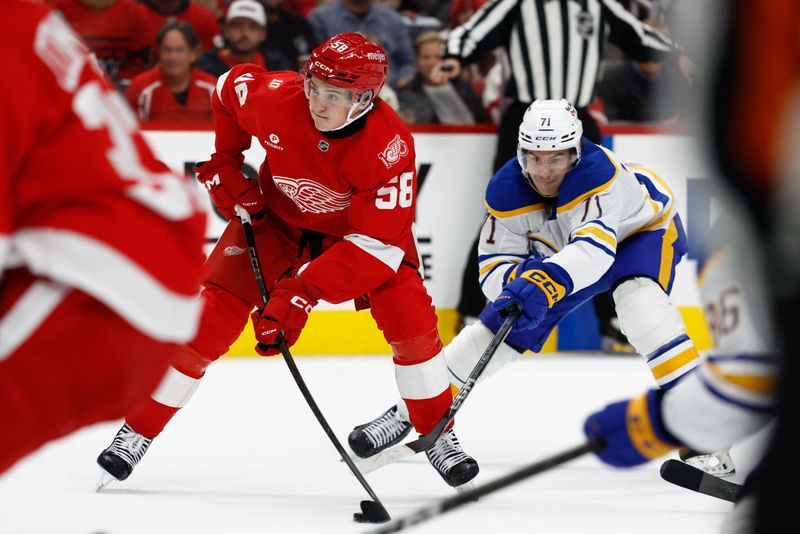 Nov 15, 2025; Detroit, Michigan, USA;  Detroit Red Wings center Emmitt Finnie (58) skates with the puck in the second period against the Buffalo Sabres at Little Caesars Arena. Mandatory Credit: Rick Osentoski-Imagn Images