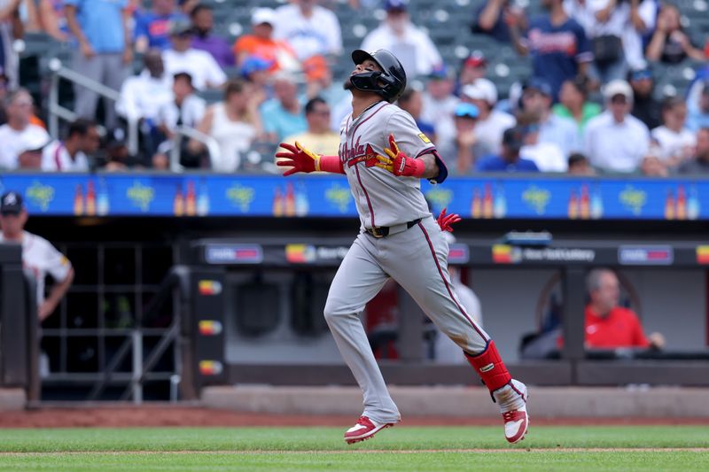 Jul 28, 2024; New York City, New York, USA; Atlanta Braves shortstop Orlando Arcia (11) rounds the bases after hitting a solo home run against the New York Mets during the seventh inning at Citi Field. Mandatory Credit: Brad Penner-USA TODAY Sports