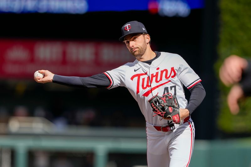 Apr 4, 2024; Minneapolis, Minnesota, USA; Minnesota Twins second baseman Edouard Julien (47) throws to first base for the out during the second inning against the Cleveland Guardians at Target Field. Mandatory Credit: Jordan Johnson-USA TODAY Sports