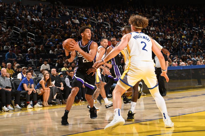 SAN FRANCISCO, CA - OCTOBER 11: Colby Jones #20 of the Sacramento Kings handles the ball during the game against the Golden State Warriors during a NBA Preseason game on October 11, 2024 at Chase Center in San Francisco, California. NOTE TO USER: User expressly acknowledges and agrees that, by downloading and or using this photograph, user is consenting to the terms and conditions of Getty Images License Agreement. Mandatory Copyright Notice: Copyright 2024 NBAE (Photo by Noah Graham/NBAE via Getty Images)