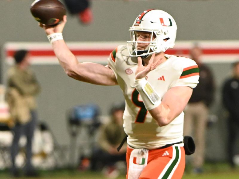 Nov 4, 2023; Raleigh, North Carolina, USA; Miami Hurricanes quarterback Tyler Van Dyke (9) throws a pass during the first half against the North Carolina State Wolfpack at Carter-Finley Stadium. Mandatory Credit: Rob Kinnan-USA TODAY Sports