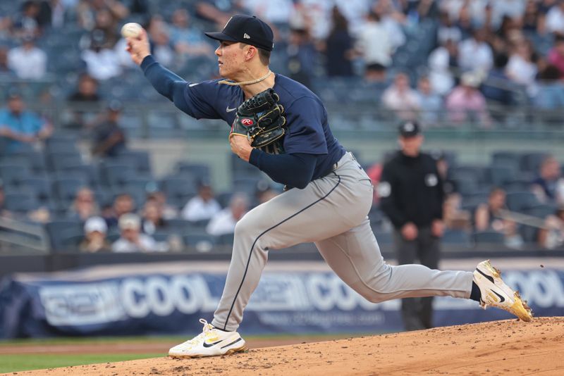 May 21, 2024; Bronx, New York, USA; Seattle Mariners starting pitcher Bryan Woo (22) delivers a pitch during the first inning against the New York Yankees  at Yankee Stadium. Mandatory Credit: Vincent Carchietta-USA TODAY Sports