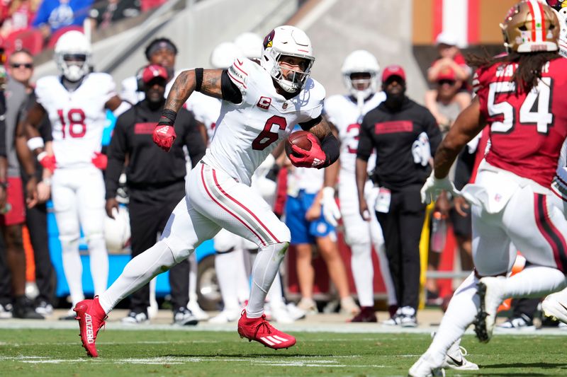 Arizona Cardinals running back James Conner (6) runs against the San Francisco 49ers during an NFL football game in Santa Clara, Calif., Sunday, Oct. 6, 2024. (AP Photo/Godofredo A. Vásquez)