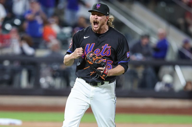 Apr 22, 2025; New York City, New York, USA;  New York Mets relief pitcher Ryne Stanek (55) reacts to a double play in the eighth inning against the Philadelphia Phillies at Citi Field. Mandatory Credit: Wendell Cruz-Imagn Images