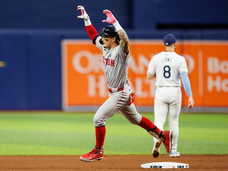 May 21, 2024; St. Petersburg, Florida, USA;  Boston Red Sox outfielder Jarren Duran (16) runs the bases after hitting a home run against the Tampa Bay Rays in the sixth inning at Tropicana Field. Mandatory Credit: Nathan Ray Seebeck-USA TODAY Sports