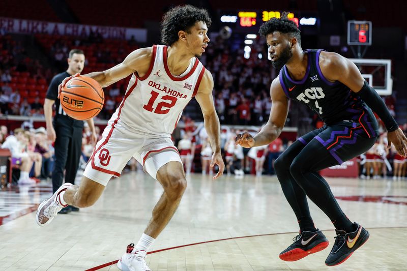 Mar 4, 2023; Norman, Oklahoma, USA; Oklahoma Sooners guard Milos Uzan (12) drives against TCU Horned Frogs guard Mike Miles Jr. (1) during the second half at Lloyd Noble Center. Oklahoma won 74-60. Mandatory Credit: Alonzo Adams-USA TODAY Sports