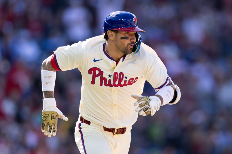 Apr 13, 2024; Philadelphia, Pennsylvania, USA; Philadelphia Phillies outfielder Nick Castellanos (8) runs the bases after hitting an RBI single during the first inning against the Pittsburgh Pirates at Citizens Bank Park. Mandatory Credit: Bill Streicher-USA TODAY Sports