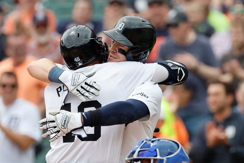 Apr 28, 2024; Detroit, Michigan, USA;  Detroit Tigers right fielder Wenceel Perez (46) celebrates with outfielder Mark Canha (21) after hitting a two run home run in the first inning against the Kansas City Royals at Comerica Park. Mandatory Credit: Rick Osentoski-USA TODAY Sports