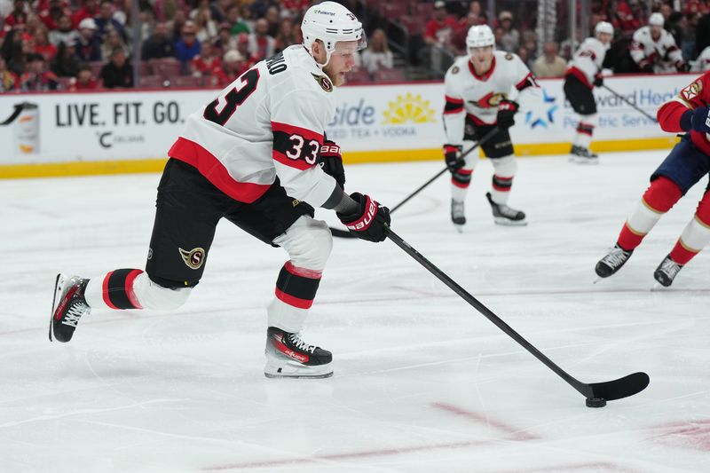 Oct 11, 2025; Sunrise, Florida, USA;  Ottawa Senators defenseman Nikolas Matinpalo (33) brings the puck up the ice against the Florida Panthers during the first period at Amerant Bank Arena. Mandatory Credit: Jim Rassol-Imagn Images