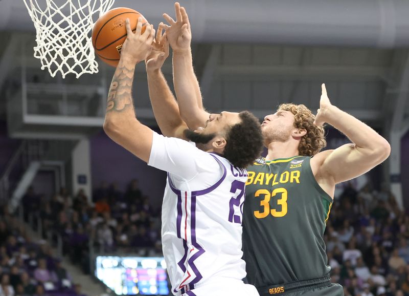 Feb 11, 2023; Fort Worth, Texas, USA;  TCU Horned Frogs forward JaKobe Coles (21) shoots and is fouled by Baylor Bears forward Caleb Lohner (33) during the first half at Ed and Rae Schollmaier Arena. Mandatory Credit: Kevin Jairaj-USA TODAY Sports