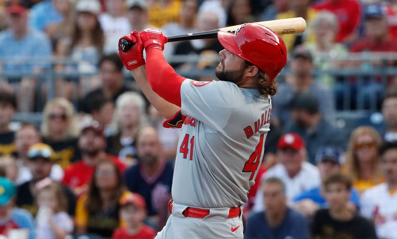 Jul 2, 2024; Pittsburgh, Pennsylvania, USA;  St. Louis Cardinals right fielder Alec Burleson (41) hits a two-run home run against the Pittsburgh Pirates during the third inning at PNC Park. Mandatory Credit: Charles LeClaire-USA TODAY Sports