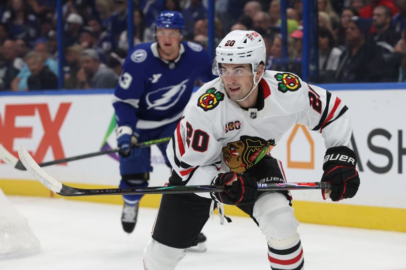 Oct 23, 2025; Tampa, Florida, USA; Chicago Blackhawks center Ryan Greene (20) skates against the Tampa Bay Lightning during the second period at Benchmark International Arena. Mandatory Credit: Kim Klement Neitzel-Imagn Images