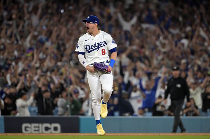 Oct 11, 2024; Los Angeles, California, USA; Los Angeles Dodgers third baseman Enrique Hernandez (8) celebrates after defeating the San Diego Padres during game five of the NLDS for the 2024 MLB Playoffs at Dodger Stadium. Mandatory Credit: Jayne Kamin-Oncea-Imagn Images