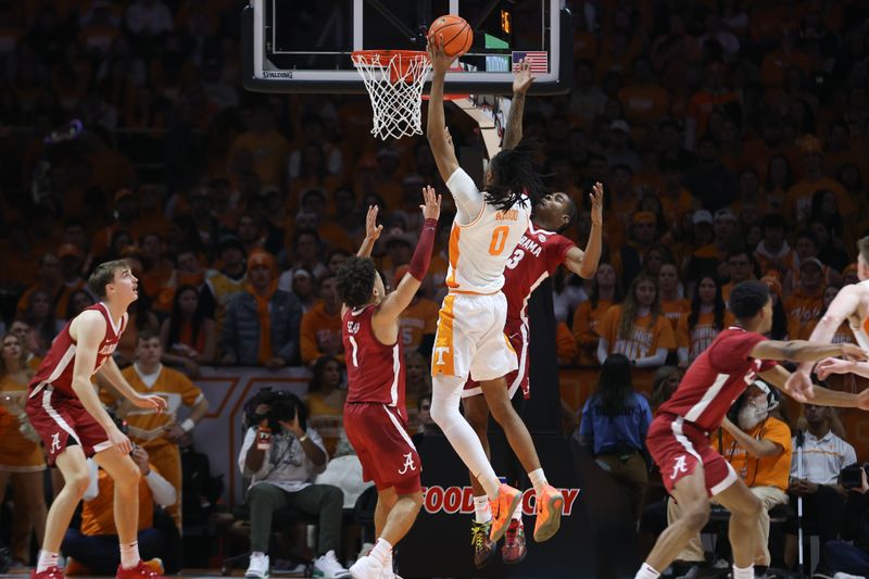 Jan 20, 2024; Knoxville, Tennessee, USA; Tennessee Volunteers forward Jonas Aidoo (0) goes to the basket against the Alabama Crimson Tide during the second half at Thompson-Boling Arena at Food City Center. Mandatory Credit: Randy Sartin-USA TODAY Sports