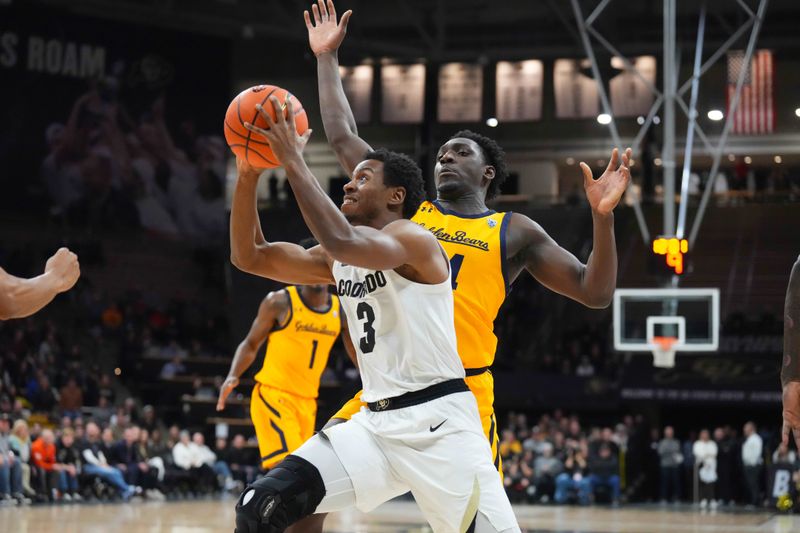 Feb 2, 2023; Boulder, Colorado, USA; Colorado Buffaloes guard Jalen Gabbidon (3) drives past California Golden Bears forward Sam Alajiki (24) in the first half at the CU Events Center. Mandatory Credit: Ron Chenoy-USA TODAY Sports