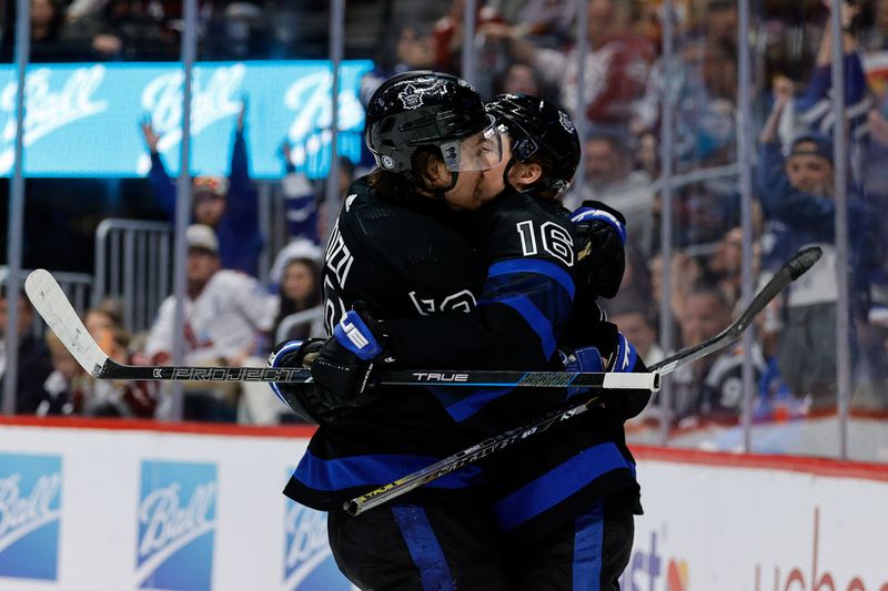 Feb 24, 2024; Denver, Colorado, USA; Toronto Maple Leafs left wing Tyler Bertuzzi (59) celebrates his goal with right wing Mitchell Marner (16) in the first period against the Colorado Avalanche at Ball Arena. Mandatory Credit: Isaiah J. Downing-USA TODAY Sports