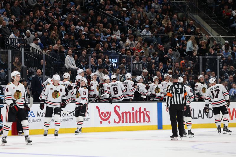 Mar 1, 2026; Salt Lake City, Utah, USA; The Chicago Blackhawks celebrate a goal by left wing Nick Foligno (17) during the second period of a game against the Utah Mammoth at Delta Center. Mandatory Credit: Rob Gray-Imagn Images