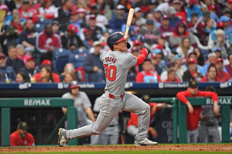 May 19, 2024; Philadelphia, Pennsylvania, USA; Washington Nationals outfielder Jacob Young (30) hits a single during the fifth inning against the Philadelphia Phillies at Citizens Bank Park. Mandatory Credit: Eric Hartline-USA TODAY Sports