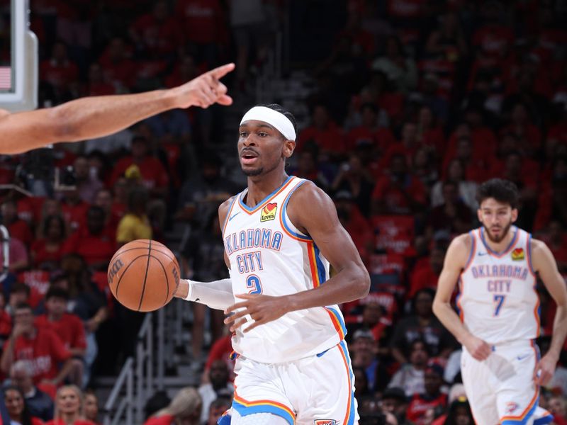 NEW ORLEANS, LA - APRIL 27:  Shai Gilgeous-Alexander #2 of the Oklahoma City Thunder handles the ball during the game against the New Orleans Pelicans during Round 1 Game 3 of the 2024 NBA Playoffs on April 27, 2024 at the Smoothie King Center in New Orleans, Louisiana. NOTE TO USER: User expressly acknowledges and agrees that, by downloading and or using this Photograph, user is consenting to the terms and conditions of the Getty Images License Agreement. Mandatory Copyright Notice: Copyright 2024 NBAE (Photo by Jeff Haynes/NBAE via Getty Images)