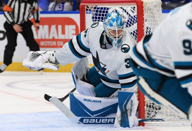 Jan 20, 2026; Tampa, Florida, USA; San Jose Sharks goaltender Yaroslav Askarov (30) looks on against the Tampa Bay Lightning during the first period at Benchmark International Arena. Mandatory Credit: Kim Klement Neitzel-Imagn Images