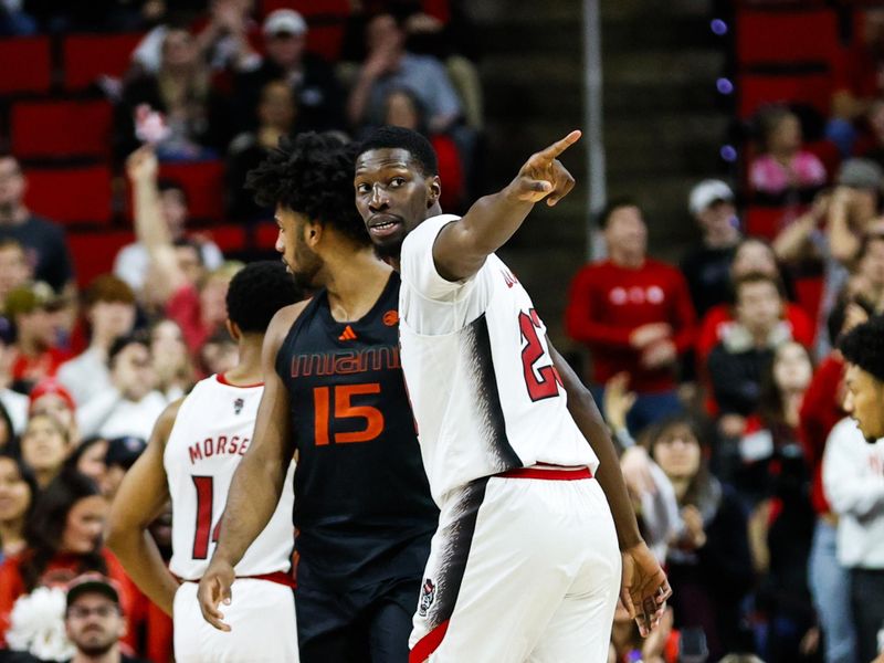 Jan 30, 2024; Raleigh, North Carolina, USA; North Carolina State Wolfpack forward Mohamed Diarra (23) celebrates  during the second half against Miami (Fl) Hurricanes at PNC Arena. Mandatory Credit: Jaylynn Nash-USA TODAY Sports