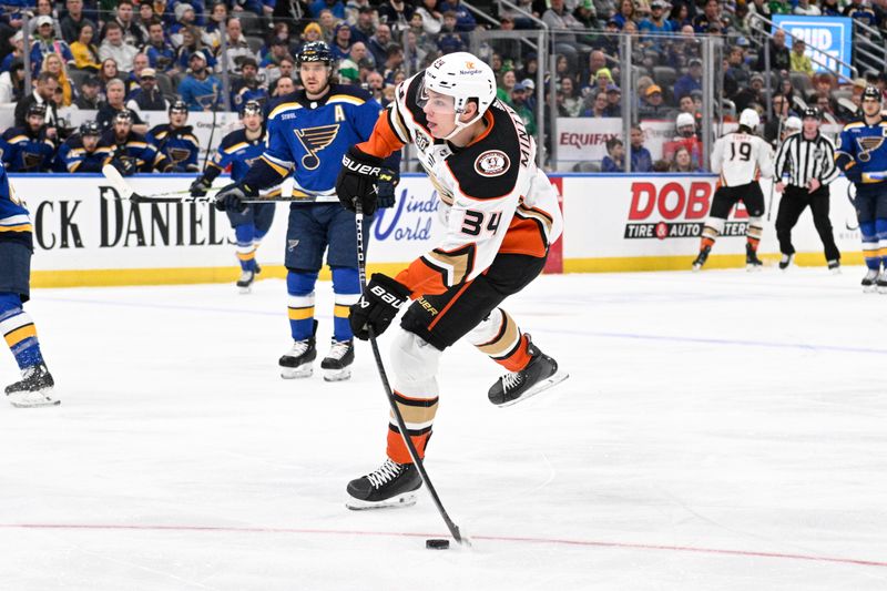 Mar 17, 2024; St. Louis, Missouri, USA; Anaheim Ducks defenseman Pavel Mintyukov (34) takes a shot against the St. Louis Blues during the first period at Enterprise Center. Mandatory Credit: Jeff Le-USA TODAY Sports